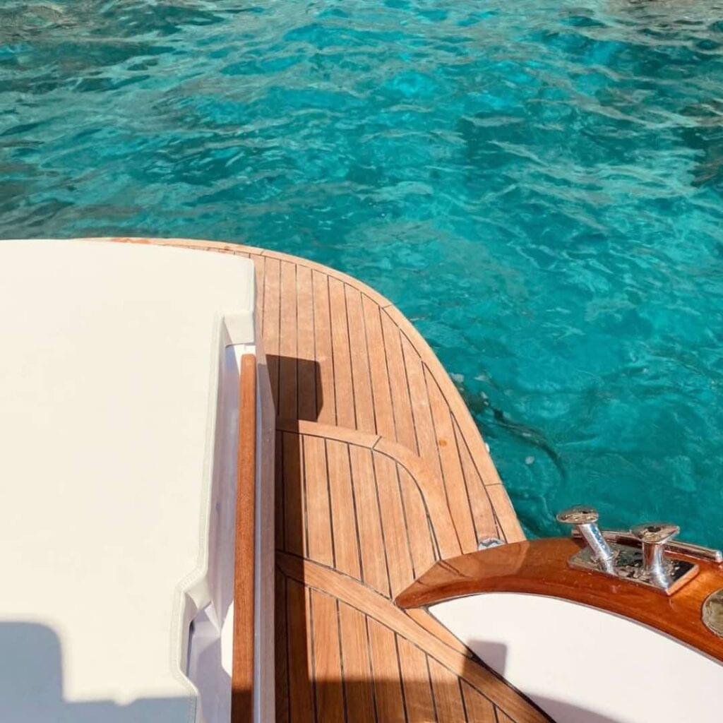 Boat with Captain in Amalfi Coast turquoise water